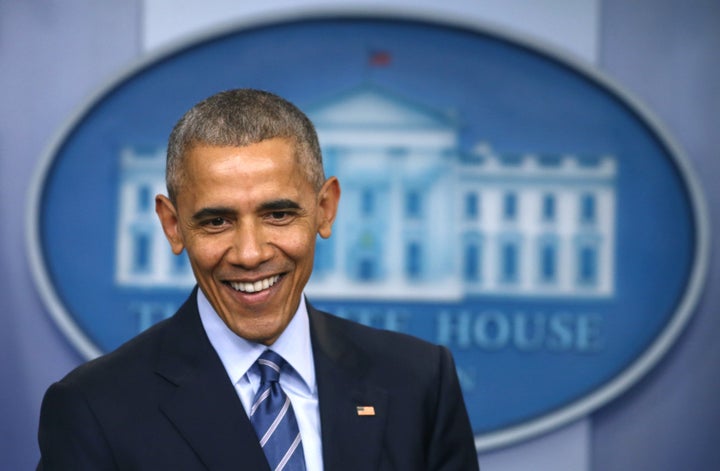 U.S. President Barack Obama smiles as he speaks to journalists during his last news conference of the year at the White House in Washington, U.S., December 16, 2016.