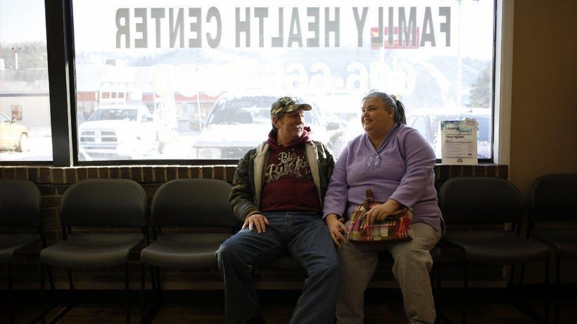 Mary Blair and her husband wait for a doctor's appointment at the Breathitt County Family Health Center in Kentucky, a state