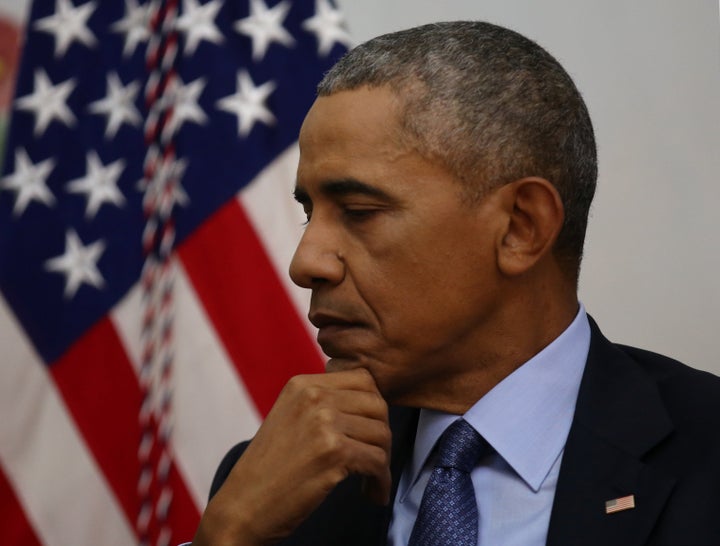 U.S. President Barack Obama (R) pauses during an interview with Vox at Blair House in Washington, U.S., January 6, 2017.