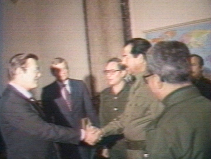 Donald Rumsfeld and Saddam Hussein shake hands in 1983 in Baghdad during the war between Iran and Iraq.