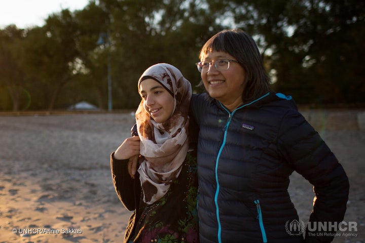 Thuy Nguyen and Narjes Nouman spend time at a beach in downtown Toronto.