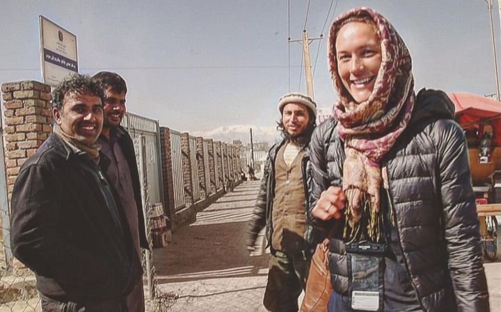 Cassie with locals in Afghanistan.