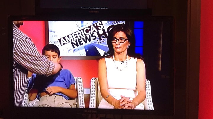 <p>My son and I waiting to be interviewed.</p>