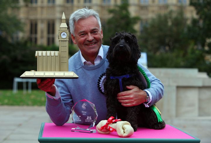 MP Alan Duncan with his cockapoo Noodle, who was announced as the winner of the Westminster Dog of the Year competition in 2013.