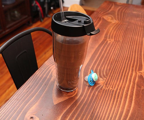 Jason’s daddy-survival kit: ice water and a pacifier.