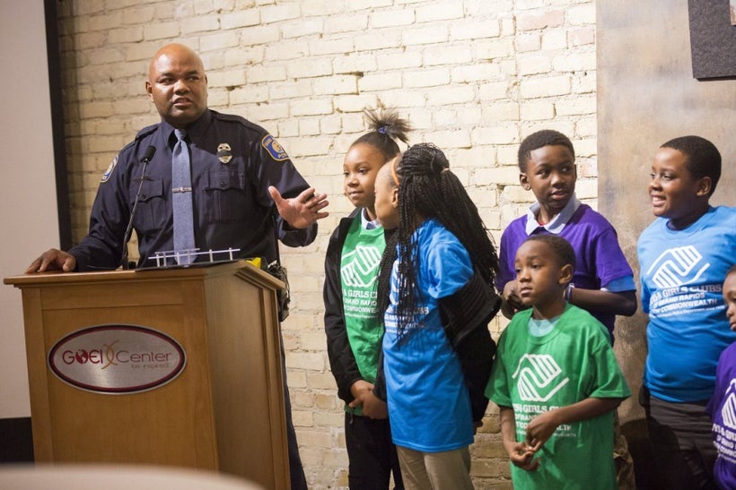 Officer Michael Harris addresses the audience at a ceremony for his 2016 Maytag Dependable Leader Award at the Goei Center in