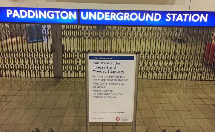 A sign warns commuters of the strike outside Paddington Underground Station 