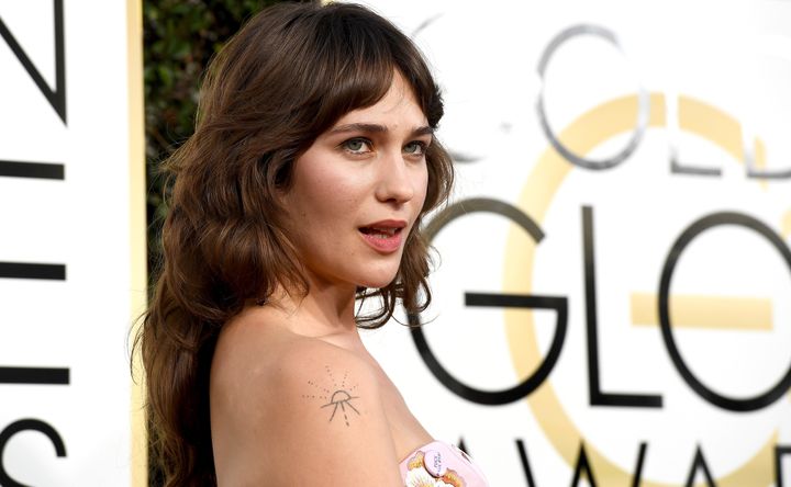 Lola Kirke rocked a pink Andrew Gn dress...and matching pink pin. 