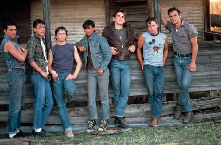 Tom Cruise, Rob Lowe, C. Thomas Howell, Ralph Macchio, Matt Dillon, Emilio Estevez and Patrick Swayze on the set of the film adaptation of "The Outsiders."