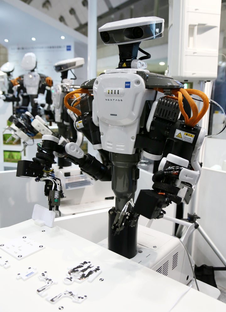 Kawada Industry's Nextage, a humanoid robot, at the International Robot Exhibition started in Tokyo on Dec. 2, 2015.