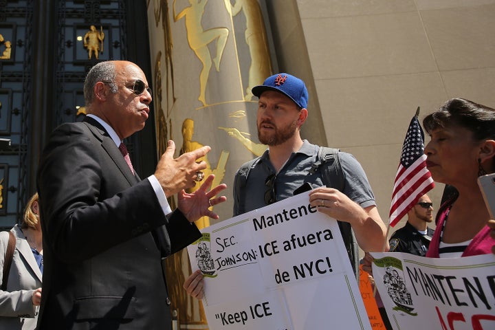 Pro-immigration protesters confront Secretary of Homeland Security Jeh Johnson on May 7, 2015 in New York City. Programs