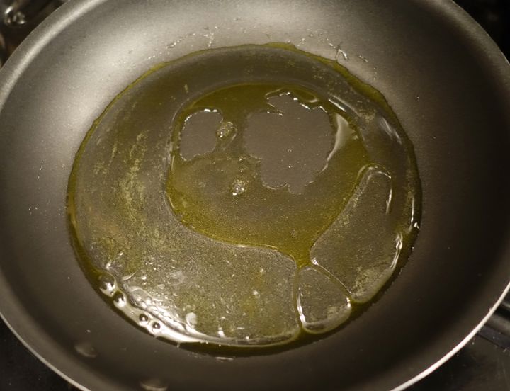 Some water, some olive oil in a non-stick skillet