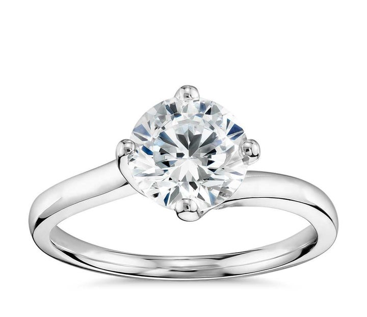 <p>Truly Zac Posen East-West Solitaire Engagement Ring, $650 (setting only).</p>