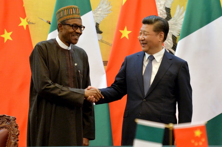 Nigerian President Muhammadu Buhari and Chinese President Xi Jinping shake hands during a signing ceremony at the Great Hall of the People in Beijing in 2016.