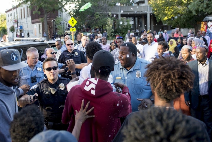 Minneapolis police escalate a peaceful protest at K’Naan’s cedar block party.