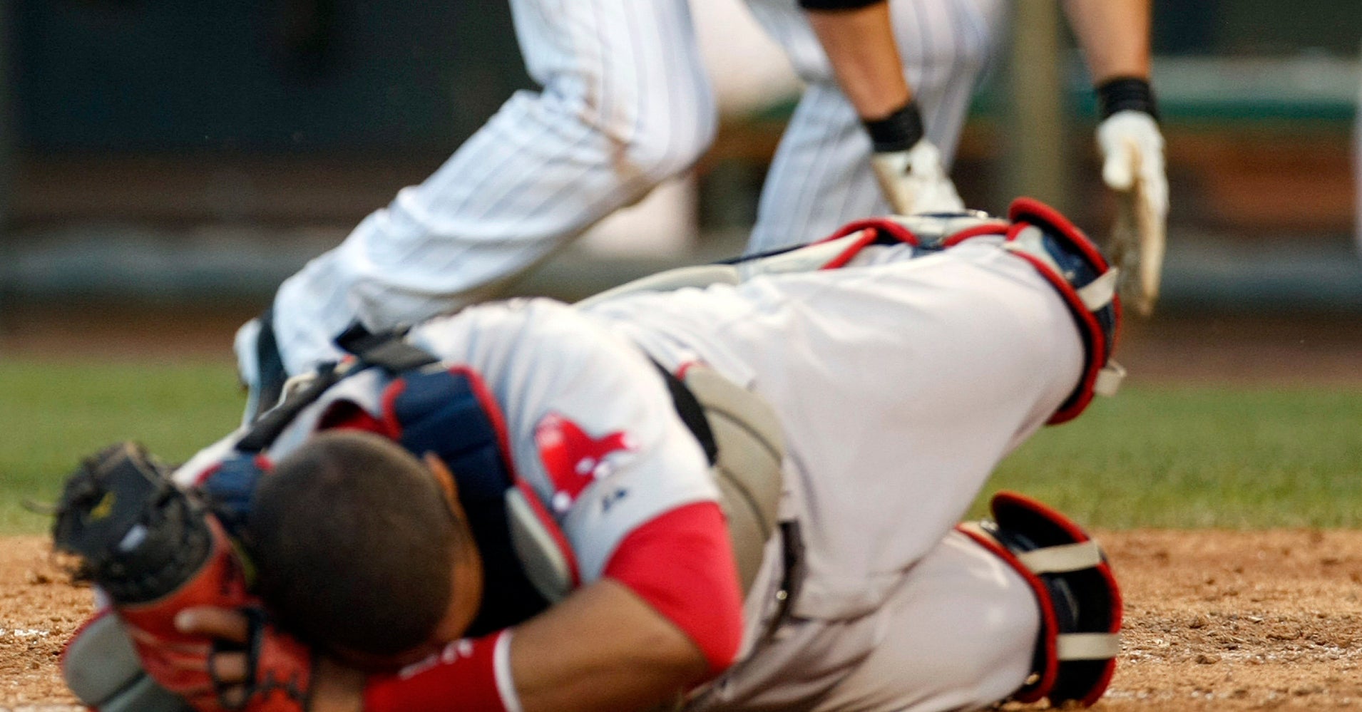 Collisions At Home Plate May Not Be Baseball Catchers' Biggest Injury