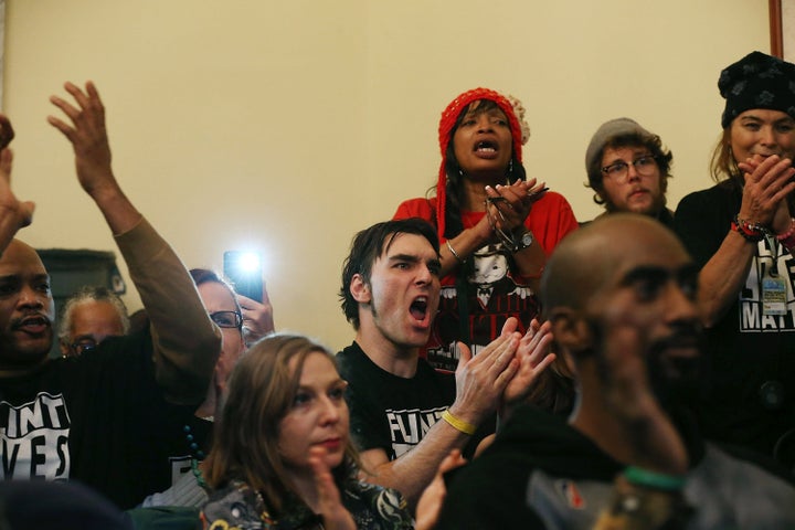 Flint residents call for justice during a news conference, after attending a House Oversight and Government Reform Committee hearing on the Flint, Michigan, water crisis on Feb. 3, 2016.