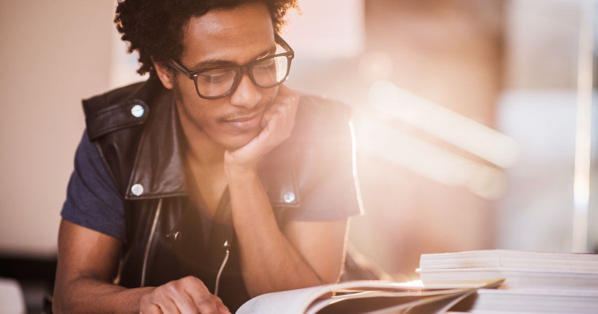 He for his studies. Studying picture. Сток on read. Young man studying. African American man with Glasses.