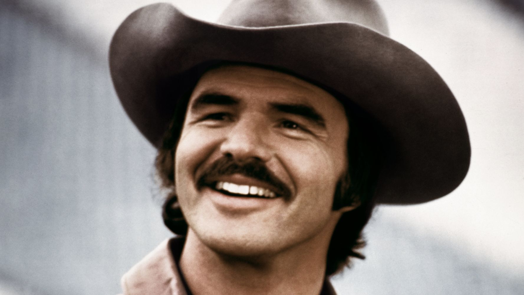 A Very Manly Ranking Of Burt Reynolds' Best Movie Mustaches