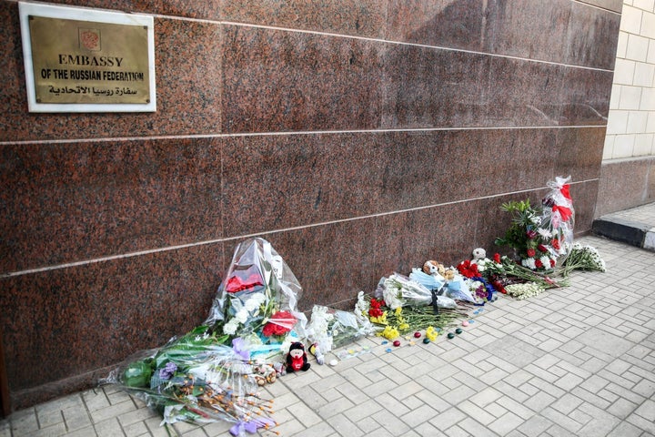 A group of Egyptian citizens leave flowers and toys for the 217 passengers on Kogalymavia Flight 9268, who lost their lives a