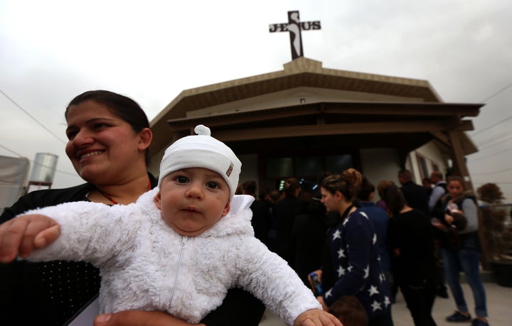 Christians at a Good Friday mass in Iraqi Kurdistan in 2016. While Kurdish authorities have welcomed Christian refugees, they have tried to absorb Christian territories into their region.