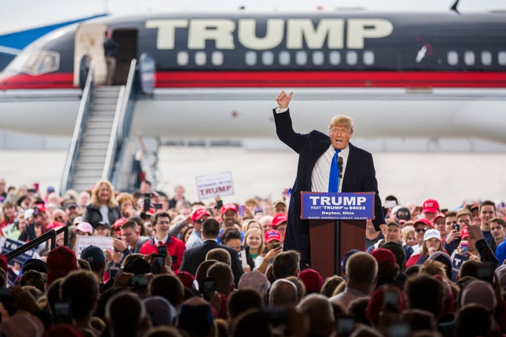 Republican Presidential candidate Donald Trump speaks at a campaign rally in front of his personal airplane, March 12, 2016 in Vandalia, Ohio.