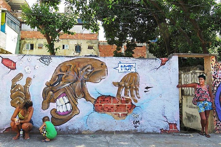 Chilean artist Edie. Meeting Of Favela 2016. Favela Operaria. Duque de Caxias. Rio De Janeiro, Brazil. 