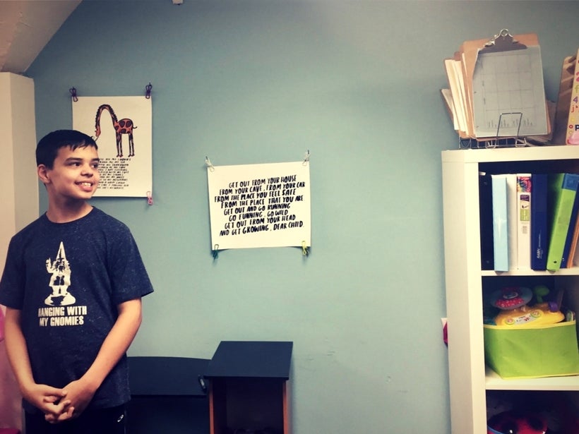 One of Autism Family Center’s work spaces (and adorable kiddos!) decorated by the illustrator and author, Dallas Clayton.