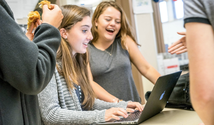 Typical student day in class in Palo Alto High Media Arts program. Students collaborate