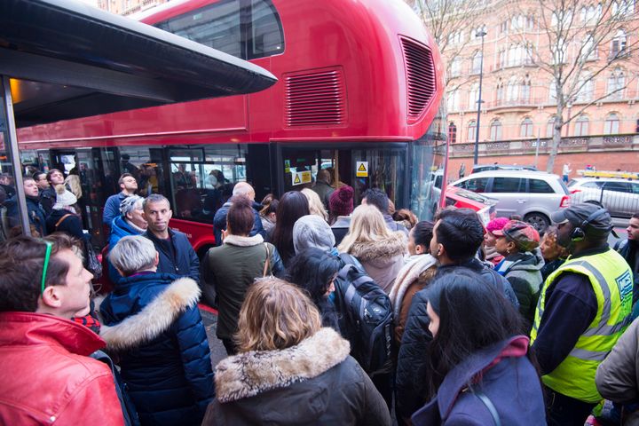 People queue for the bus during Monday's tube strike