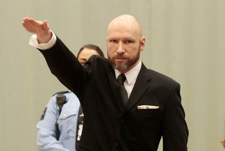 Anders Behring Breivik makes a Nazi salute in court in Skien, Norway