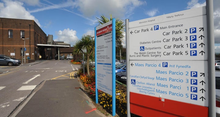 <strong>Lukasz Robert Pawlowski was taken to Morriston Hospital by air ambulance after cutting his throat while appearing in court</strong>
