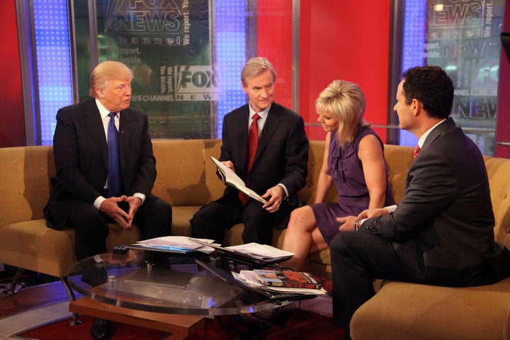 Gretchen Carlson interviews Donald Trump in 2011 with "FOX & Friends" co-hosts Steve Doocy and Brian Kilmeade. 