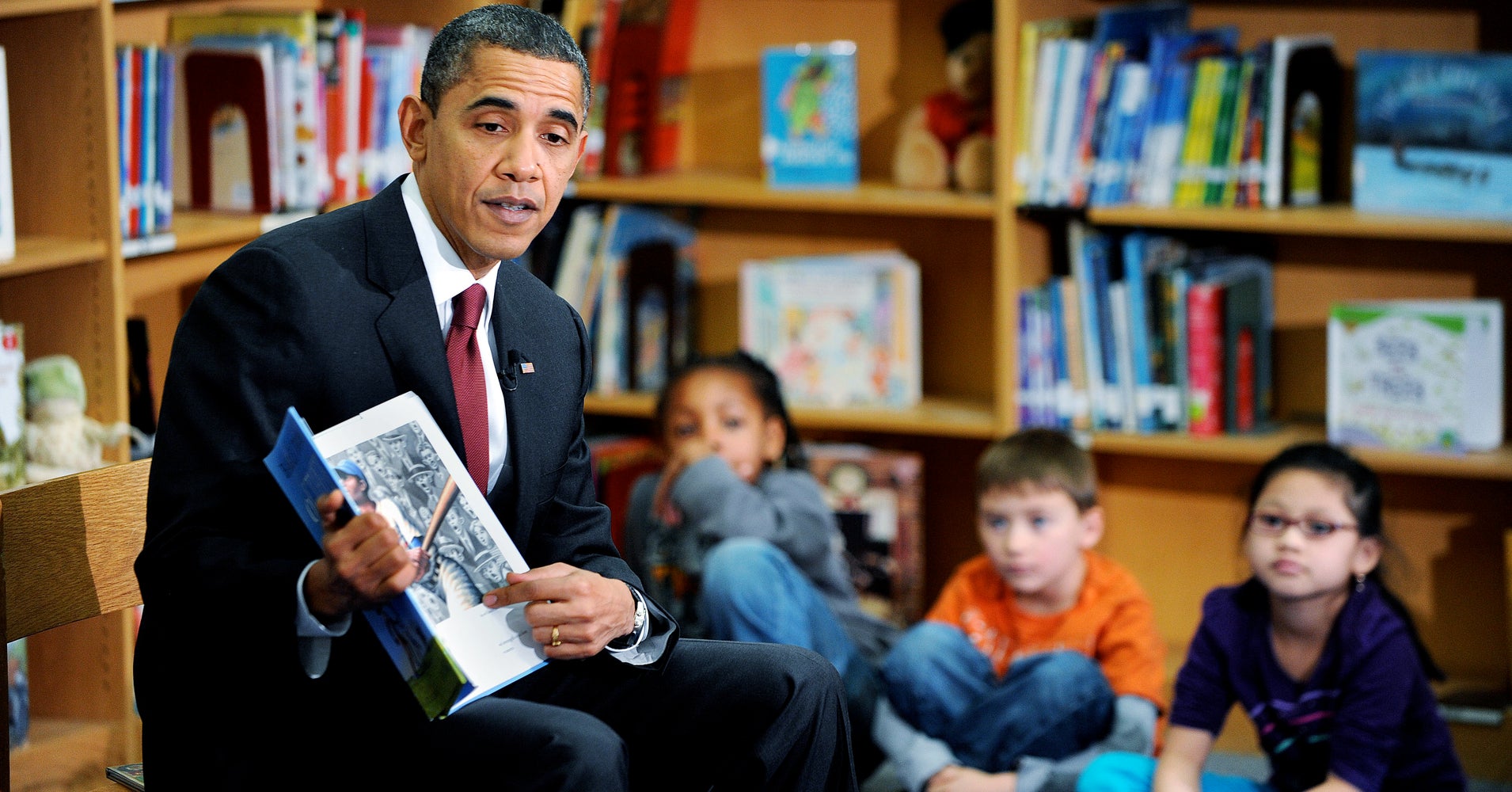 Резултат с изображение за barack obama reading book