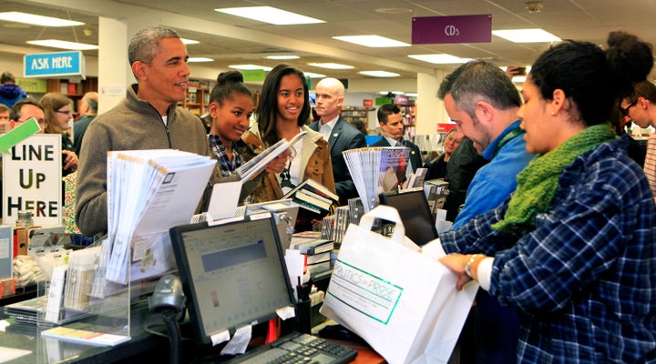 President Obama shopping for books at local D.C. bookstore Politics and Prose in 2014.