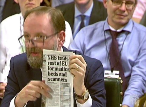 Simons Stevens holds up a Daily Mail story