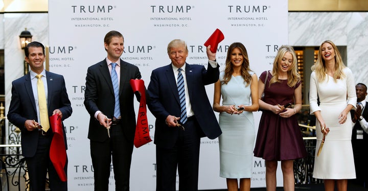 Donald Trump and his family attend an official ribbon-cutting ceremony at the new Trump International Hotel in Washington on Oct. 26, 2016.