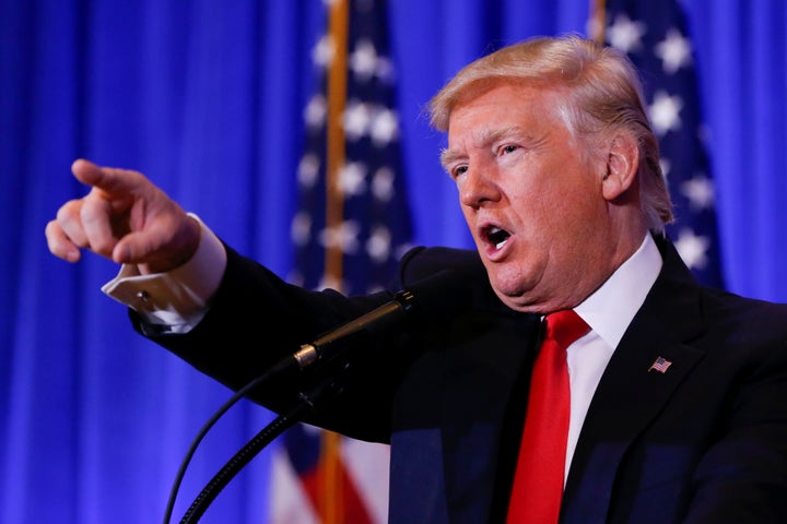 Donald Trump points during his press conference on Wednesday at Trump Tower