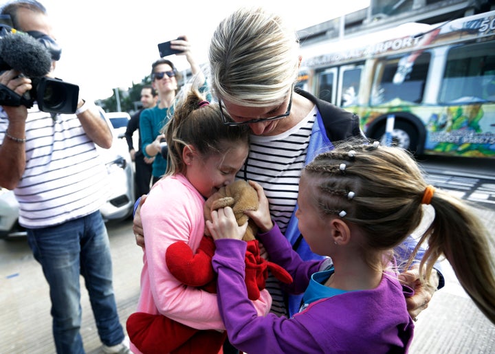 After airport officials tracked the bear down, Lariviere wrote on Twitter that her daughter and the bear had a "sweet reunion."