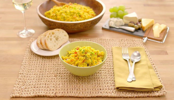 This 117-calorie "couscous" includes a flavorful mix of black olives, tomato, cucumber, dried apricots, bell pepper, alm