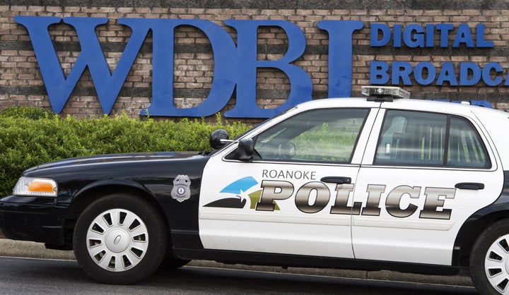 The Roanoke Police Department patrols at the gate of WDBJ's television studios August 27, 2015, in Roanoke, Virginia. Reporte
