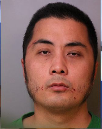 Zhang Huang is accused of attacking his new bosses with a meat cleaver.