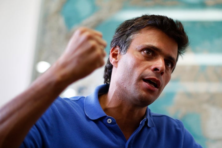 Venezuelan opposition leader Leopoldo Lopez gestures while speaking during an interview with Reuters in Caracas, February 11,