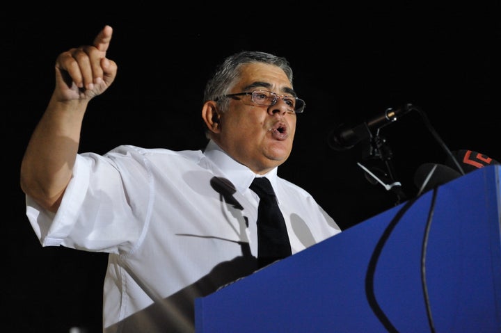 Nikolaos Michaloliakos, leader of the Golden Dawn party, addresses supporters. Golden Dawn, Greece's extremist far-right part