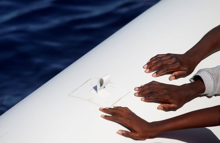 Rescuers saved about 3,000 migrants but found more than 50 dead on boats near the coast of Libya on Wednesday. 