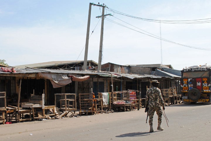 At least eight people were killed and about 100 others were kidnapped by suspected Boko Haram militants in an overnight raid