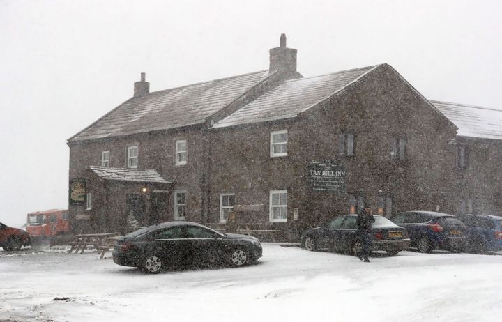 Snow falls at the Tan Hill Inn in North Yorkshire, as blizzard conditions are set to sweep in