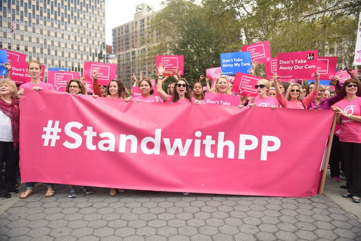 Activists hold Planned Parenthood banner in Foley Square, New York City.