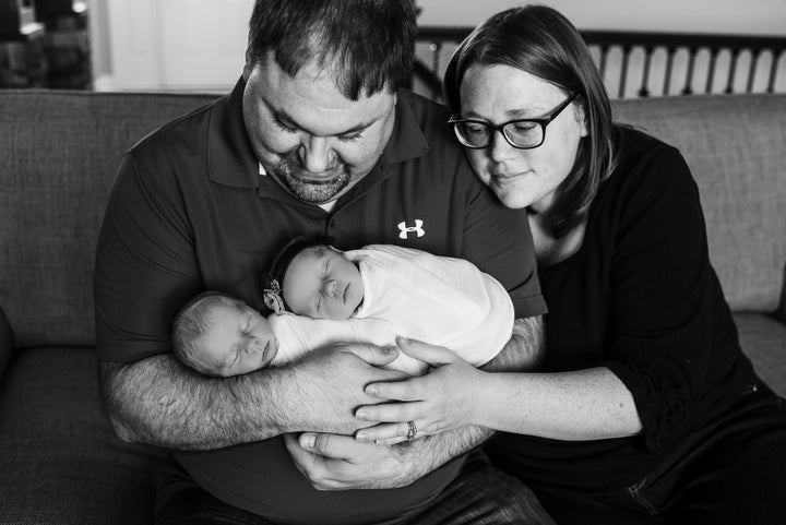 Lyndsay and Matthew cuddle with their kids.