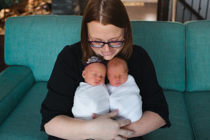 Lyndsay looks lovingly down at her twins.